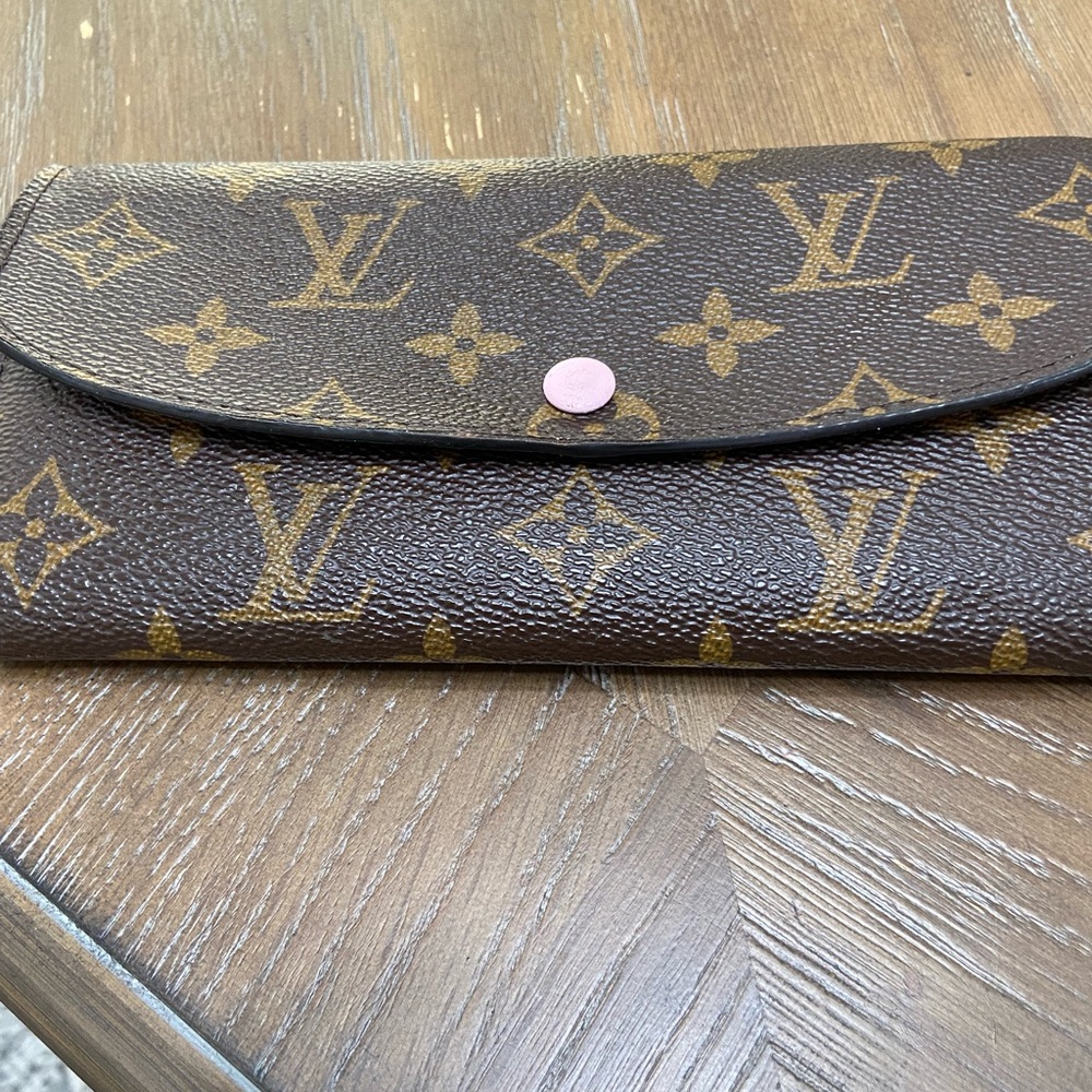 Louis Vuitton monogram wallet.
